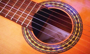 Tapa armónica para guitarras acústicas